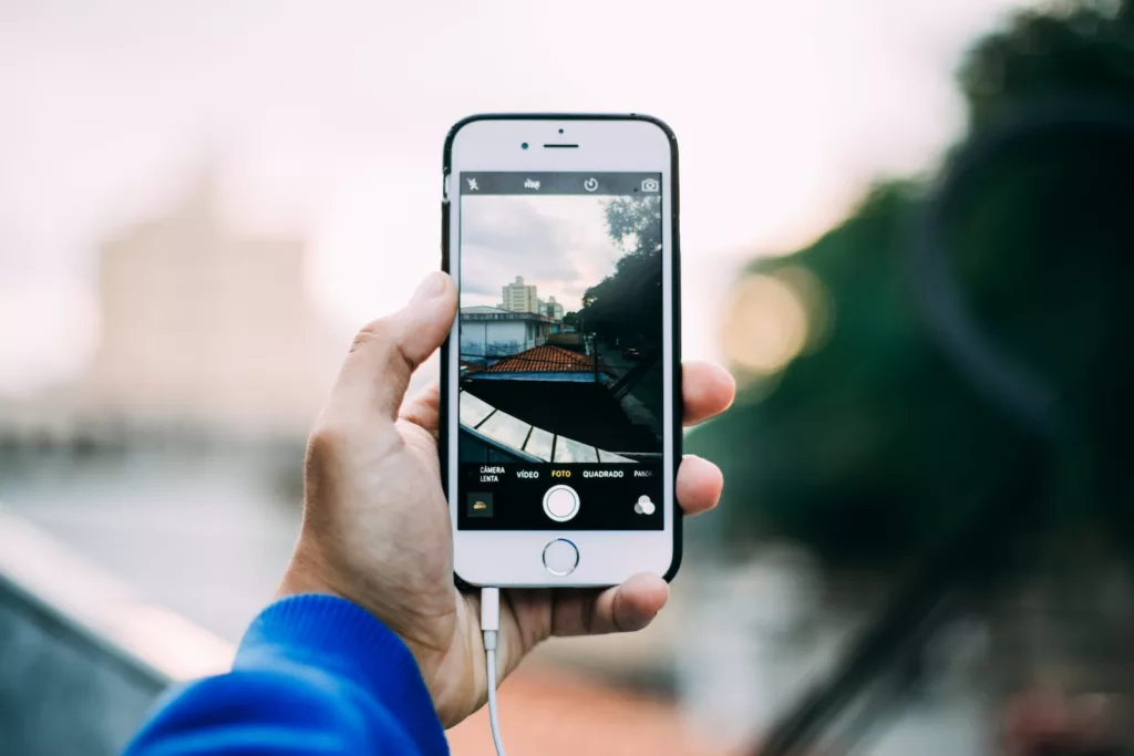 Person Holding Iphone 6 Outdoor